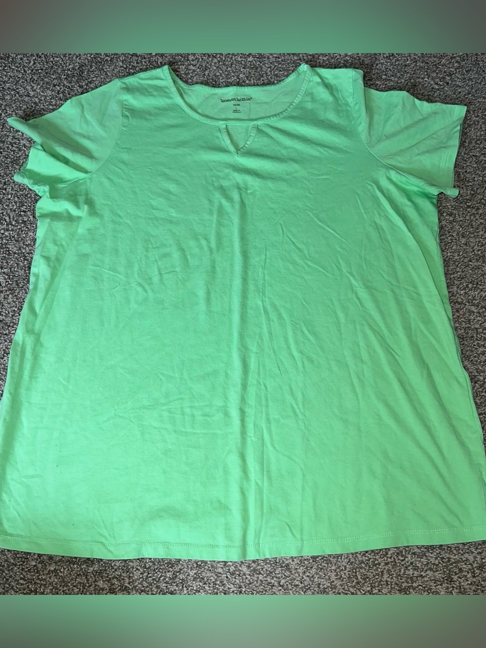 Woman within Green Scoop Neck Short Sleeve Top